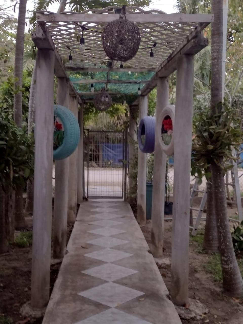 Casa de hóspedes Palapas De *